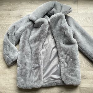 Faux fur coat.
